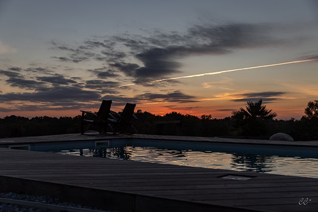 Coucher de soleil sur l'une des piscines