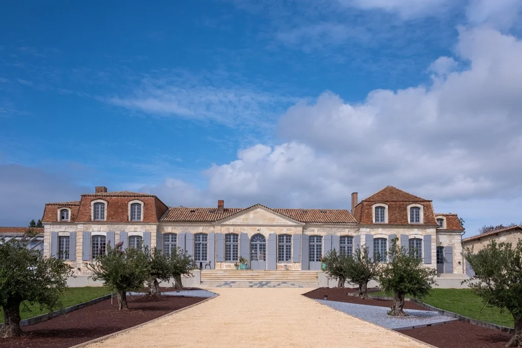 Wedding chateau in France: courtyard and facade of Château Prieuré Marquet